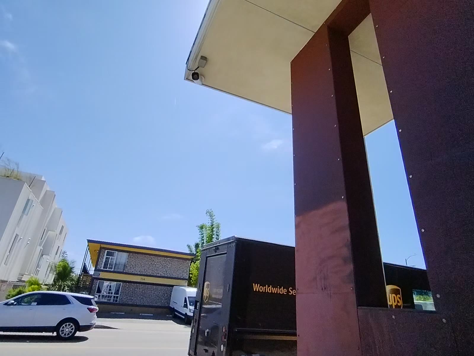 Observing delivery trucks in the parking lot
